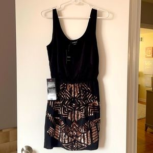 Bebe black & gold dress size small